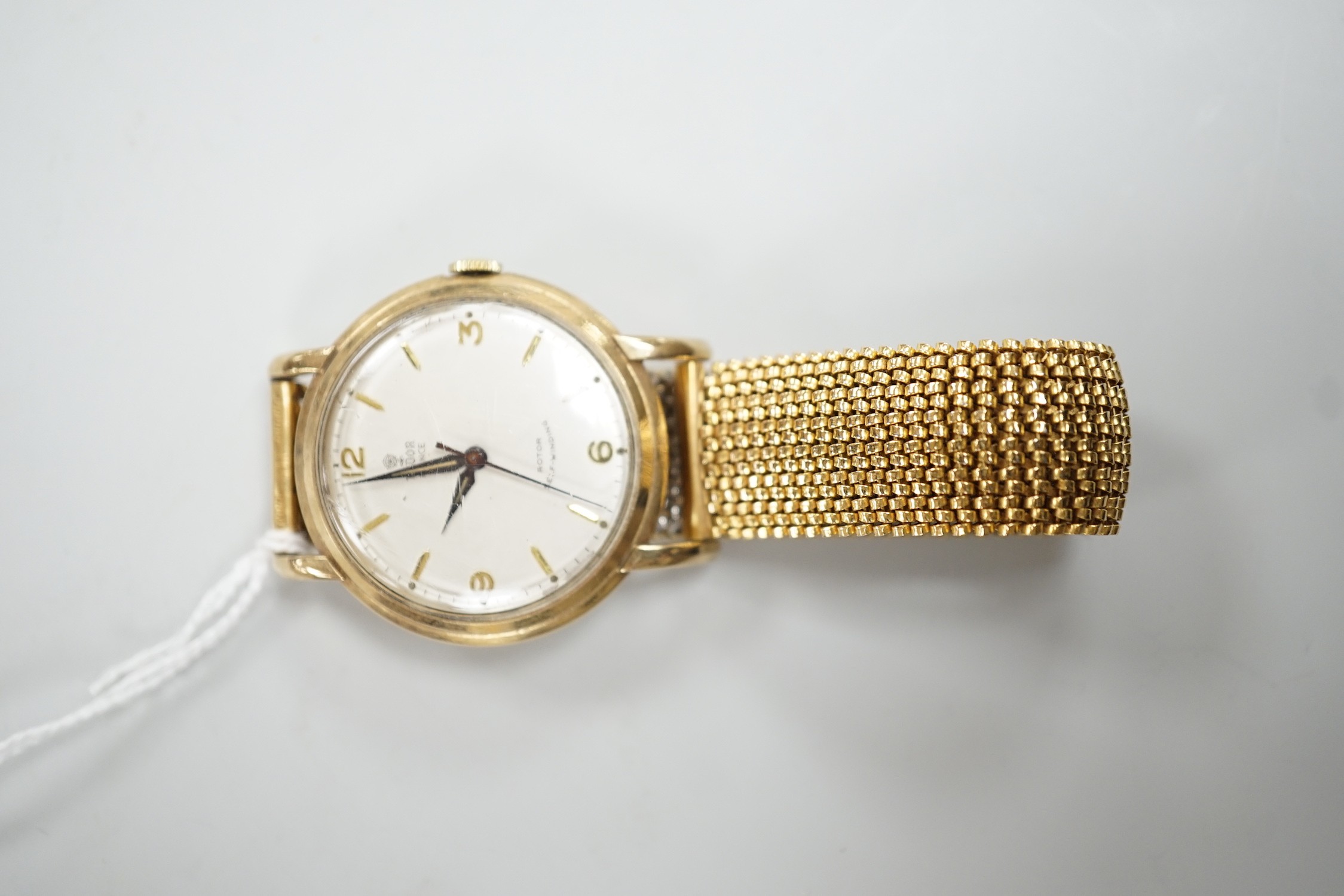 A gentleman's 9ct gold Tudor Prince Rotor Self-Winding wrist watch, on later associated flexible bracelet, case diameter 35mm, with Tudor box.